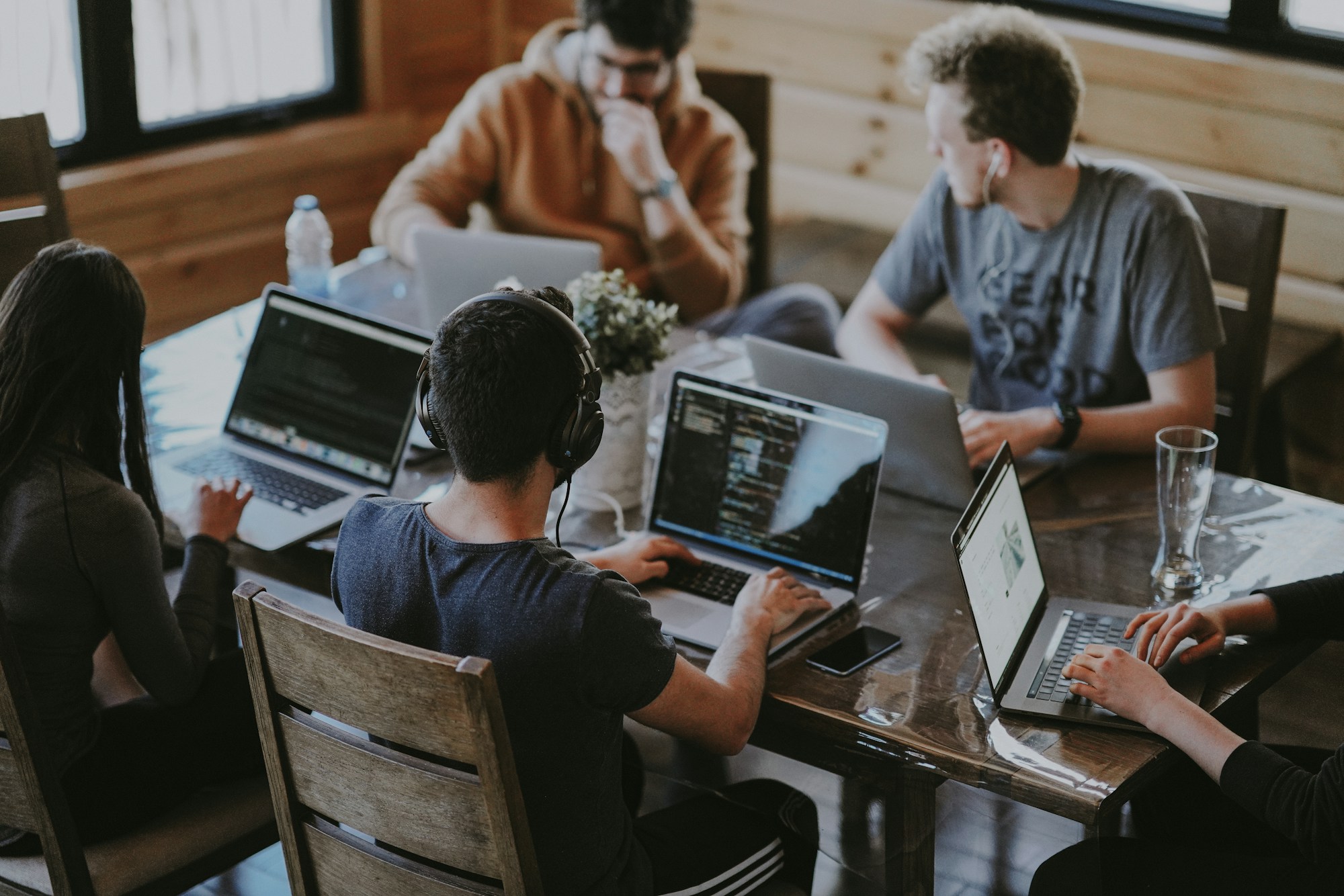 A team collaborating on laptops with Microsoft 365
